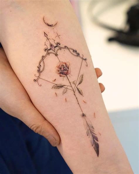 elegant tattoos for females|feminine powerful tattoo.